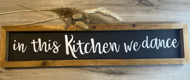 In this Kitchen we dance sign